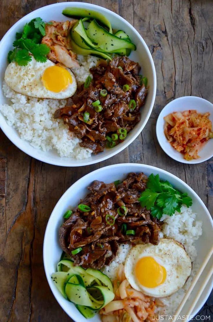 Colorful Asian rice bowl with fresh veggies and meat, ideal for healthy family lunches.