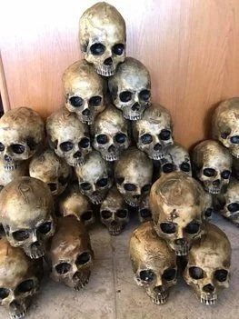 Creepy milk jug skulls for Halloween decorations and DIY ideas.