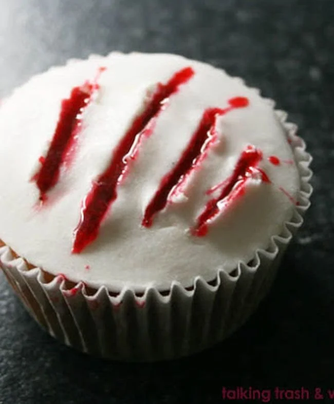 Scary Halloween claw blood cupcakes decorated for Halloween party