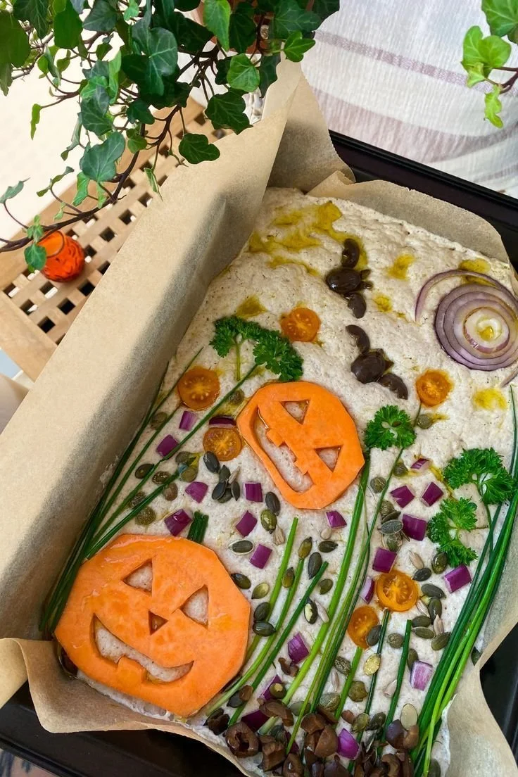 Spookily designed Halloween Focaccia art with festive toppings