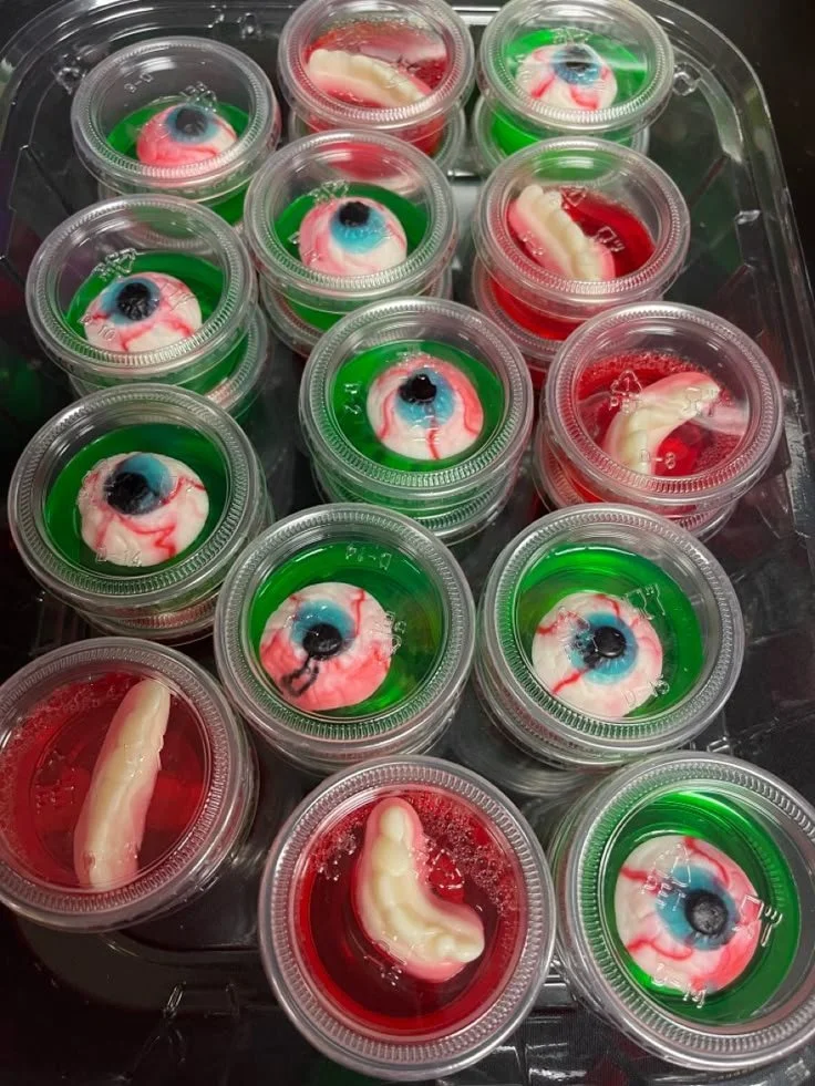 Halloween themed Jell-O shots in spooky shapes for a festive party
