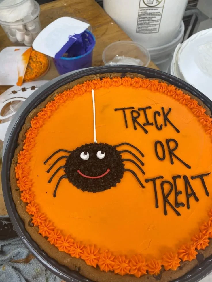 Spooky spider cookie decorated for Halloween.