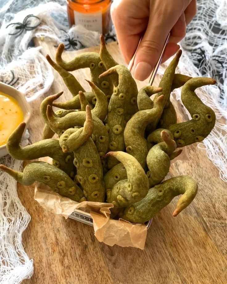 Sweet Potato Tentacles Halloween Appetizer served on a decorative plate