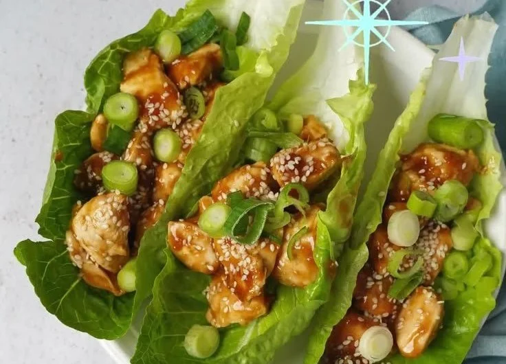 Low-calorie teriyaki chicken lettuce wraps with fresh vegetables