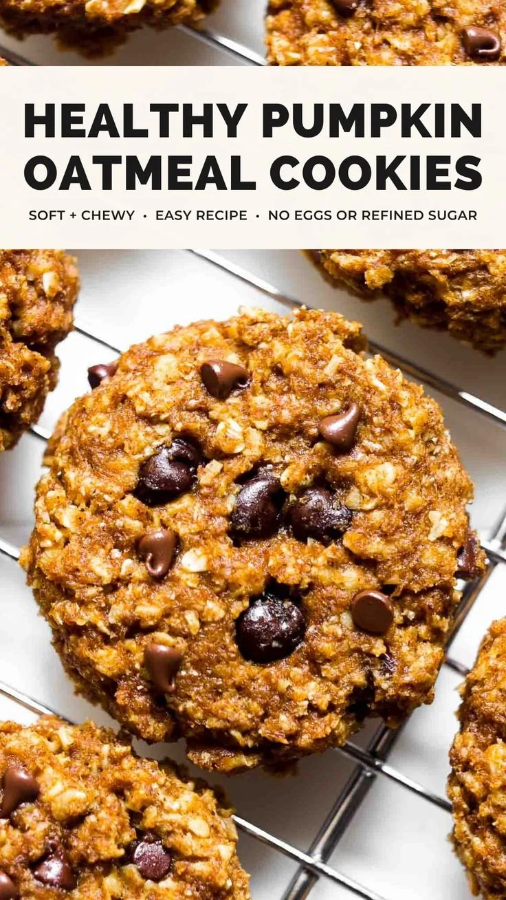Healthy pumpkin chocolate chip oatmeal cookies on a rustic wooden table