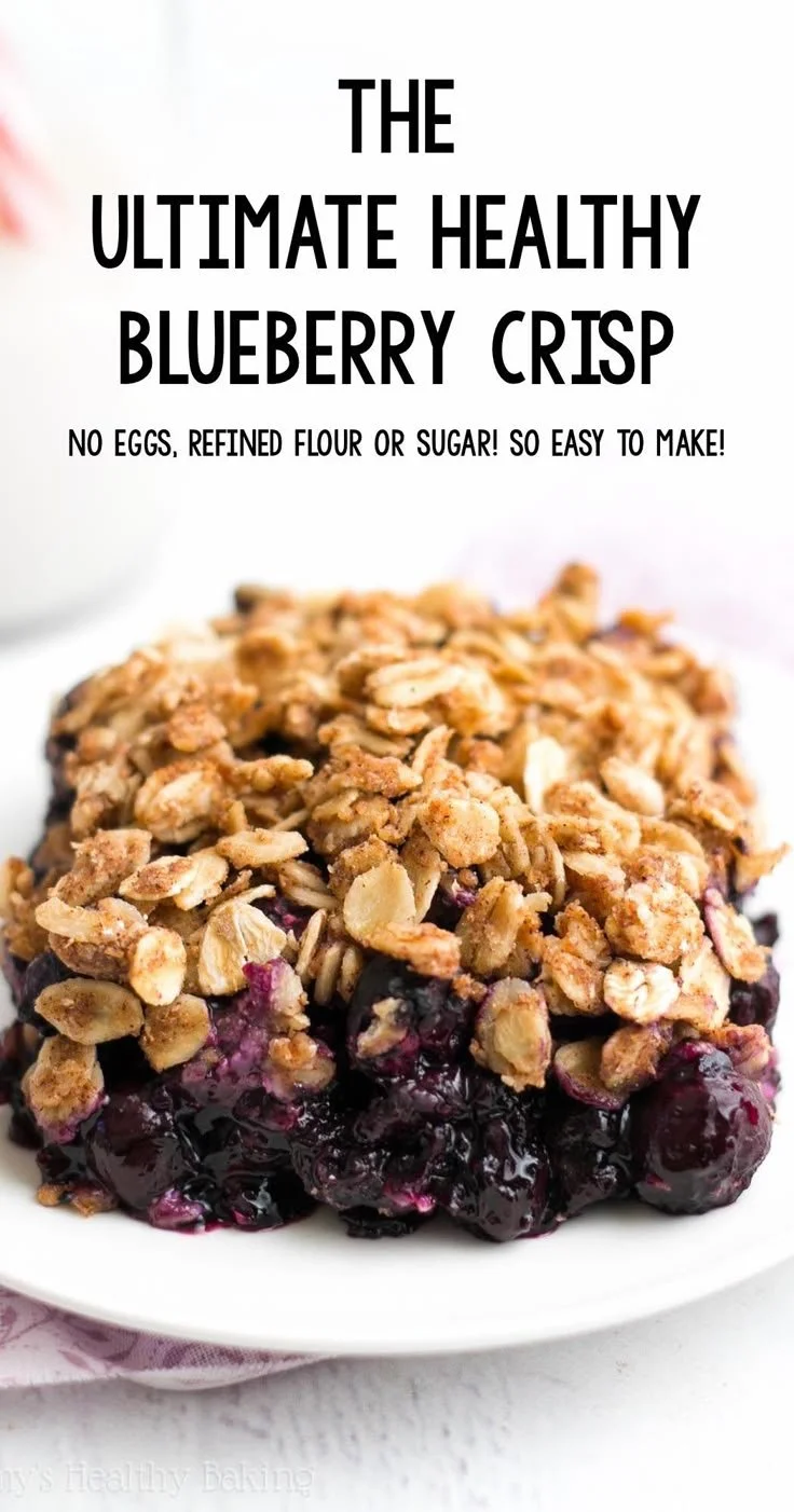 A delicious and healthy blueberry crumble dessert, topped with oats and nuts.